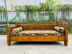 Shahi daybed sofa cum bed, front view with bolster cushions