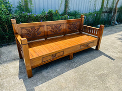 Shahi daybed frame, three-quarter view of the carved teak finish
