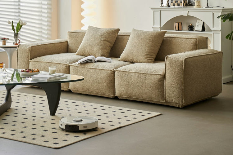 Living room with a beige modular sofa