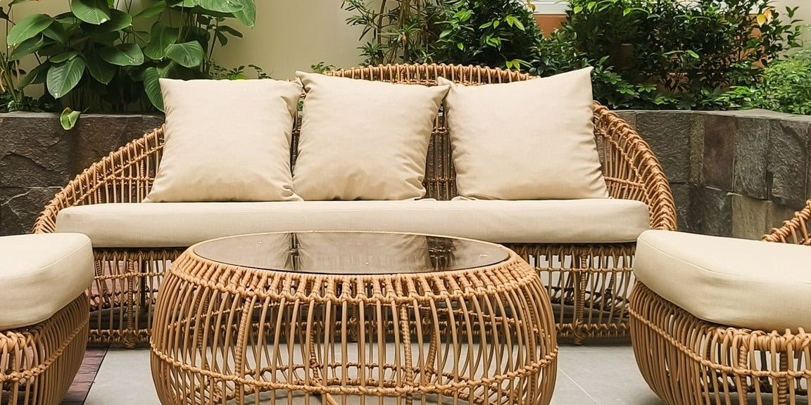 Nest rattan 3 seater sofa with cream cushions